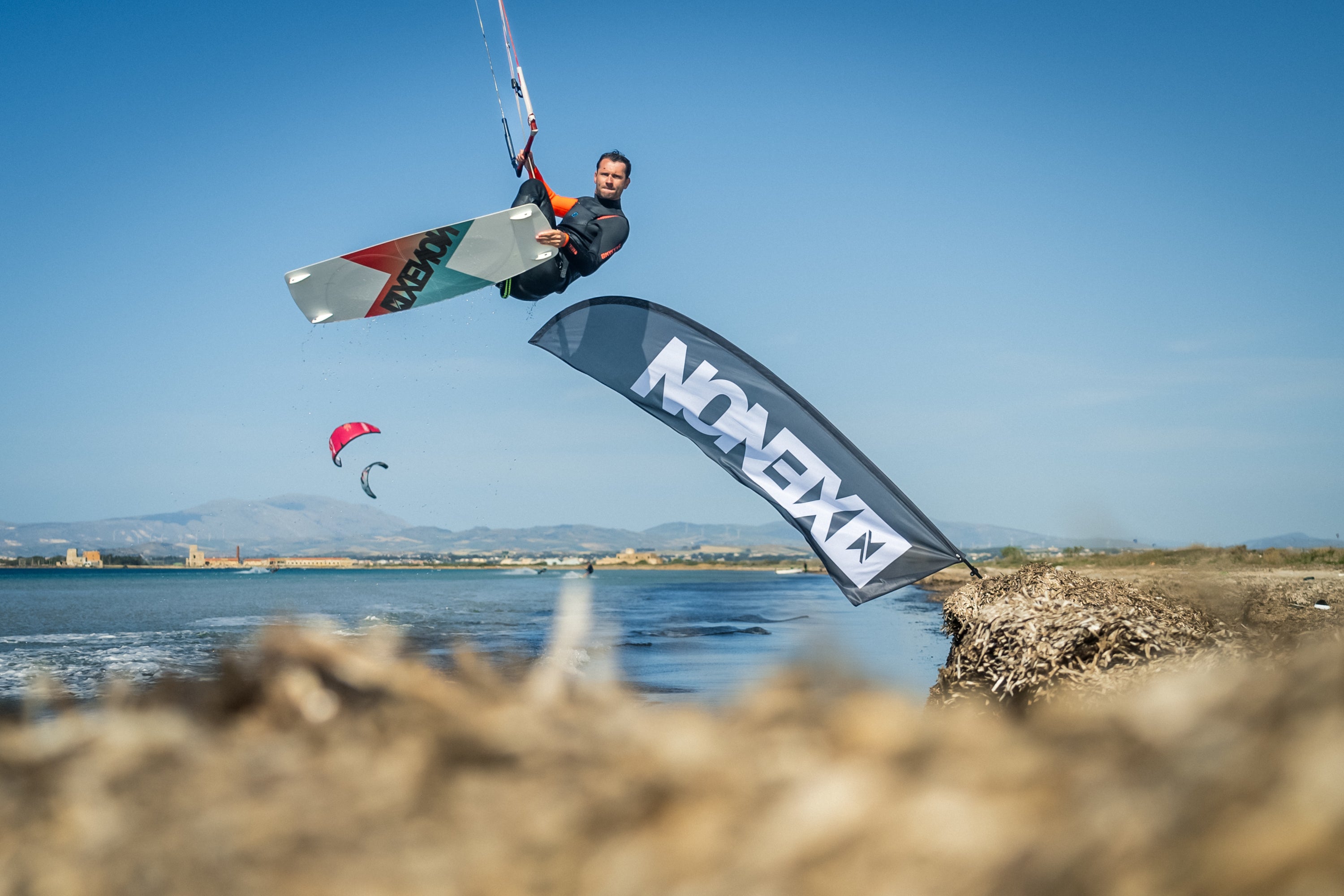 Action picture of the Xenon Laluz 2024 twintip kiteboard board.