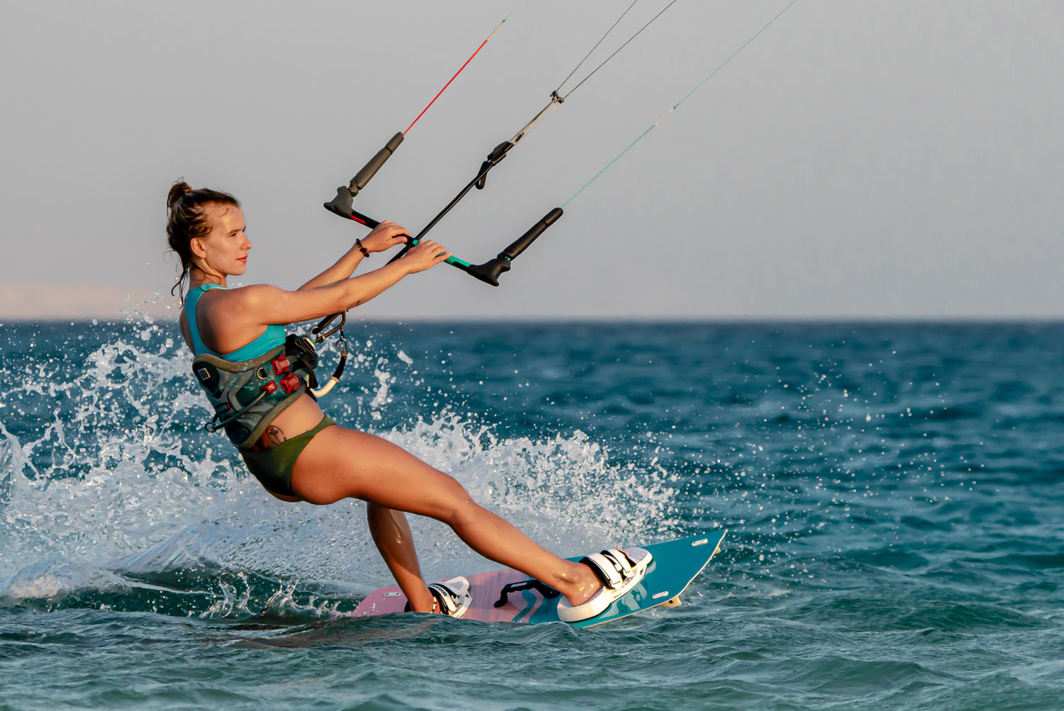 Action picture of the Xenon Women 2024 twintip kiteboard board.