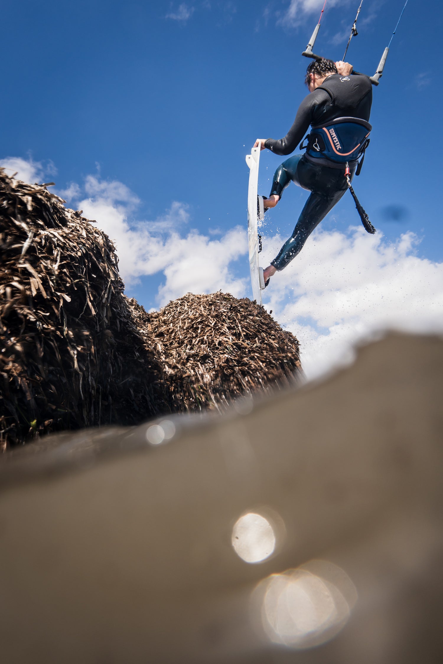 Action picture of the Xenon Boards Laluz 2024 twintip kiteboard board.