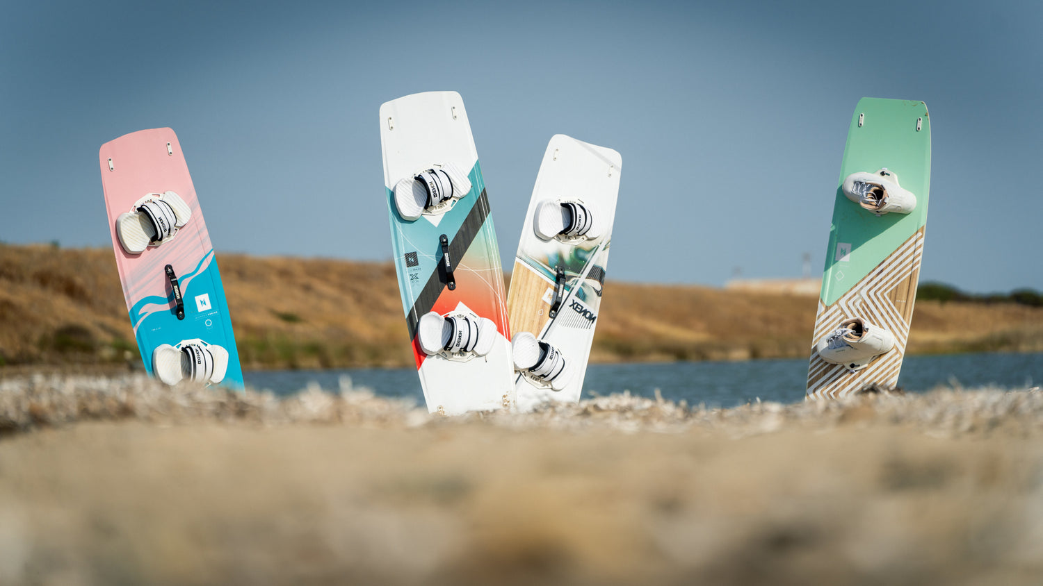 Action picture of the Xenon 2024 Laluz, Rayo, Women and Hop twintip kiteboards.