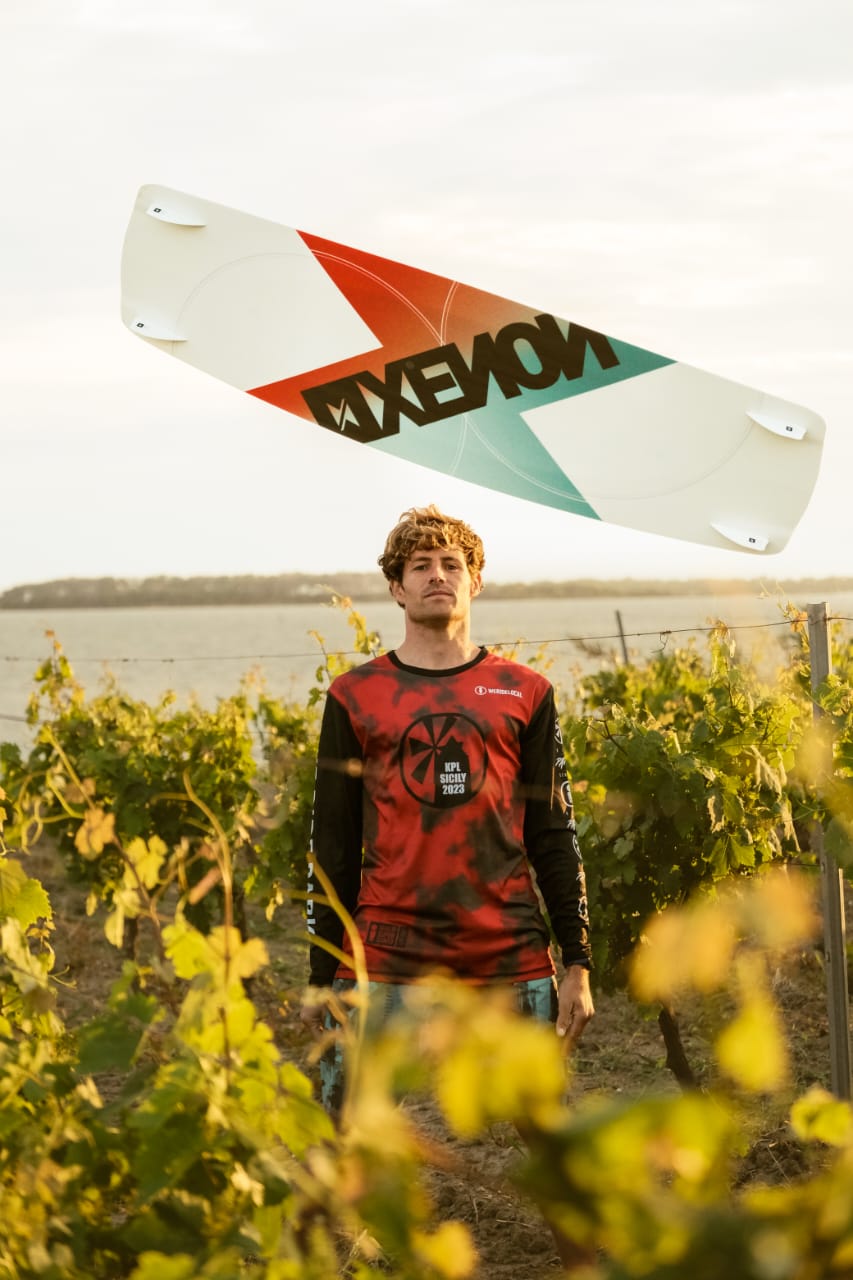 Action picture of the Xenon Boards Laluz 2024 twintip kiteboard board.