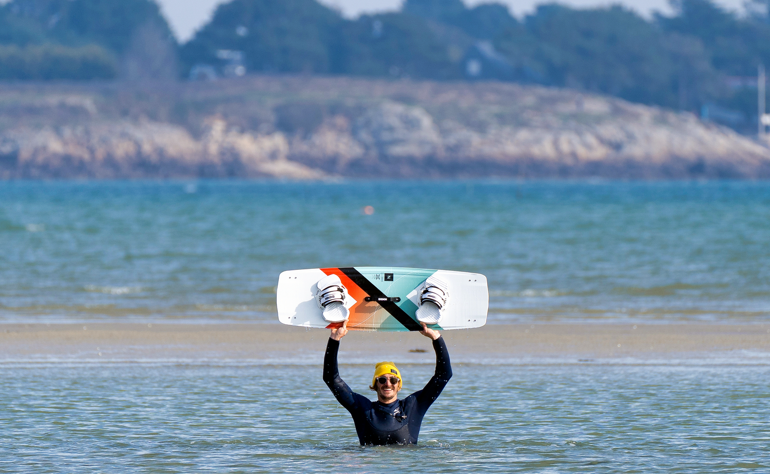 Action picture of the Xenon Boards Laluz 2024 twintip kiteboard board.